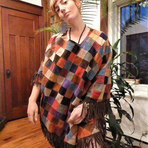 Poncho en cuir